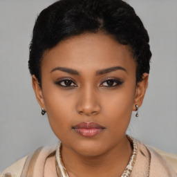 Neutral latino young-adult female with short  black hair and brown eyes