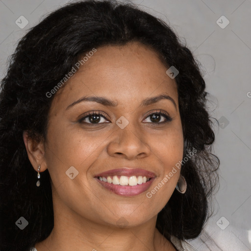 Joyful black young-adult female with long  brown hair and brown eyes