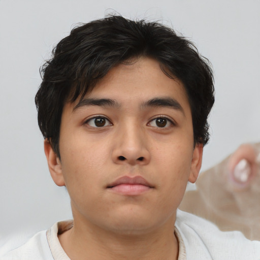 Neutral asian young-adult male with short  brown hair and brown eyes