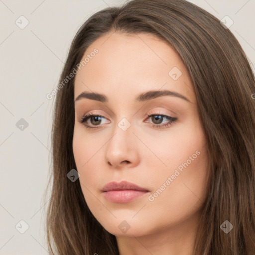 Neutral white young-adult female with long  brown hair and brown eyes