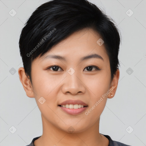 Joyful asian young-adult female with short  black hair and brown eyes