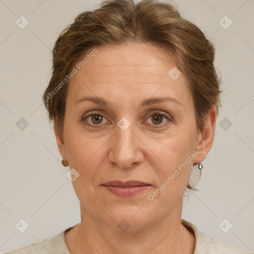 Joyful white adult female with short  brown hair and brown eyes