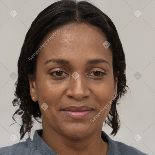 Joyful black young-adult female with medium  brown hair and brown eyes