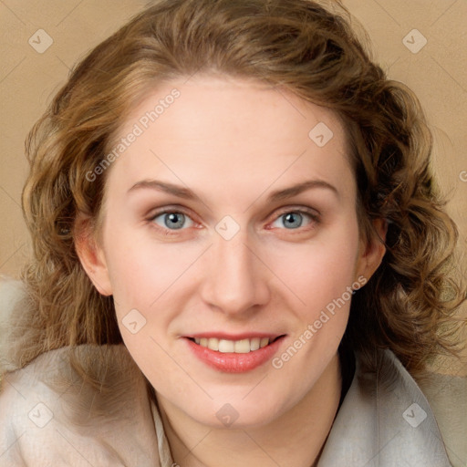 Joyful white young-adult female with long  brown hair and green eyes