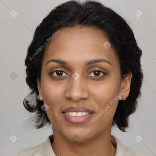 Joyful black young-adult female with medium  black hair and brown eyes