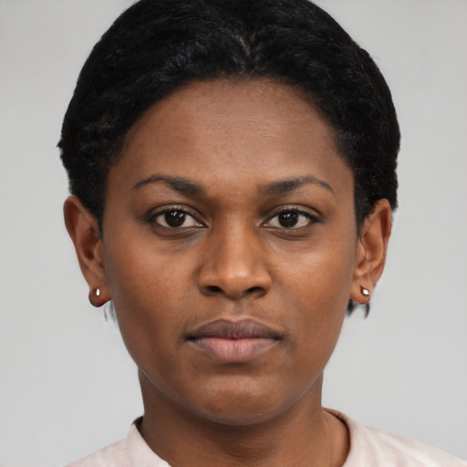 Neutral black young-adult female with short  black hair and brown eyes