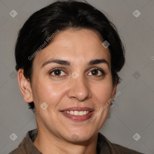 Joyful white adult female with medium  brown hair and brown eyes