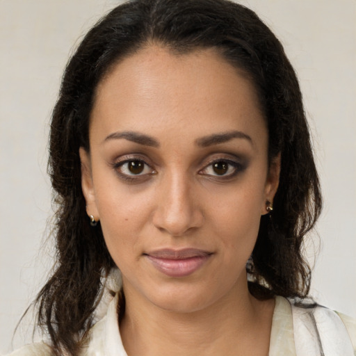 Neutral latino young-adult female with medium  brown hair and brown eyes