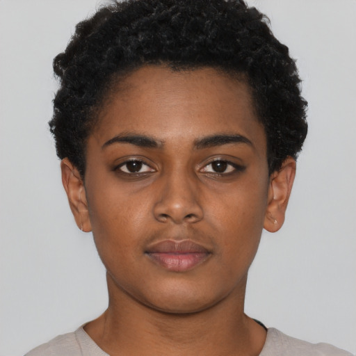 Neutral black young-adult female with short  black hair and brown eyes
