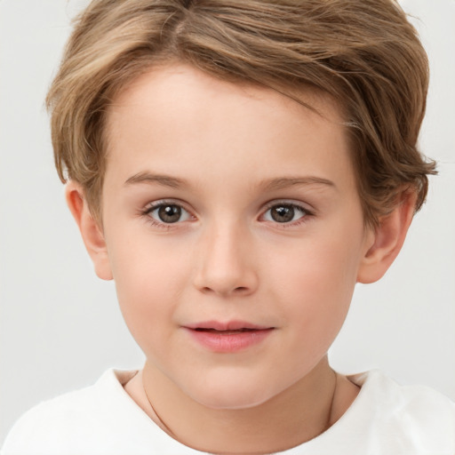 Joyful white child female with short  brown hair and brown eyes