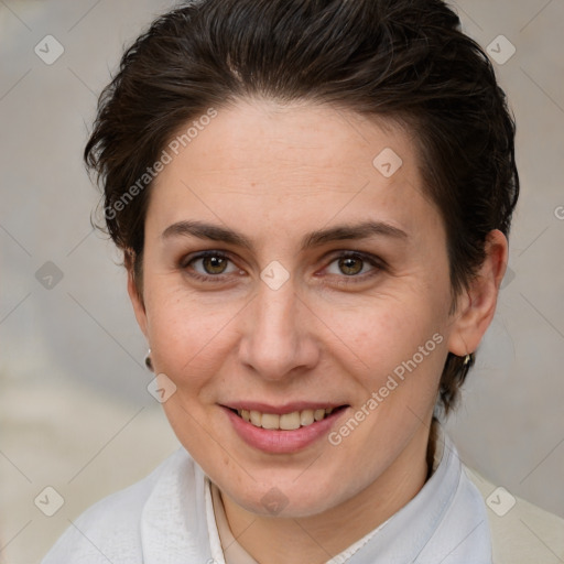 Joyful white adult female with short  brown hair and brown eyes