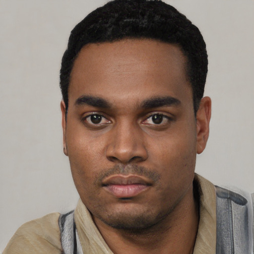 Neutral black young-adult male with short  black hair and brown eyes