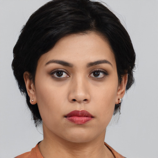 Neutral asian young-adult female with medium  black hair and brown eyes