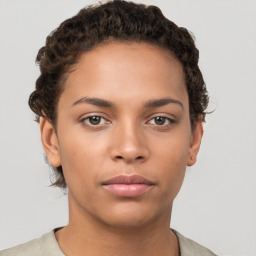 Neutral white young-adult female with short  brown hair and brown eyes