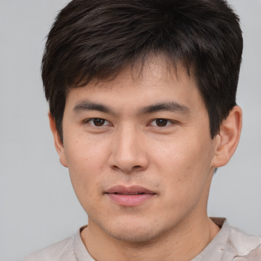 Neutral asian young-adult male with short  brown hair and brown eyes