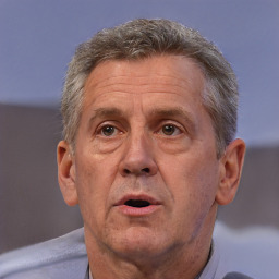 Neutral white middle-aged male with short  brown hair and brown eyes