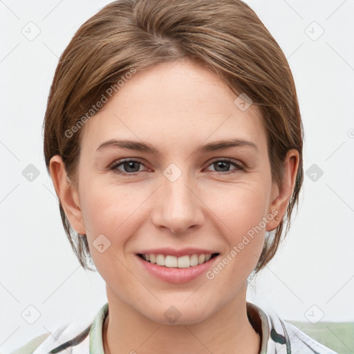 Joyful white young-adult female with medium  brown hair and grey eyes