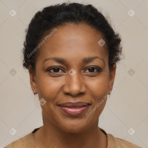 Joyful black adult female with short  brown hair and brown eyes