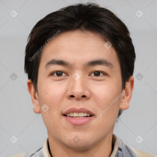 Joyful asian young-adult male with short  brown hair and brown eyes