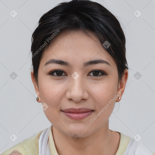Joyful asian young-adult female with short  brown hair and brown eyes
