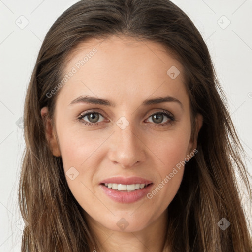 Joyful white young-adult female with long  brown hair and brown eyes