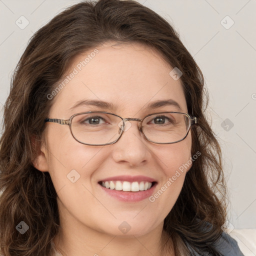 Joyful white young-adult female with long  brown hair and green eyes