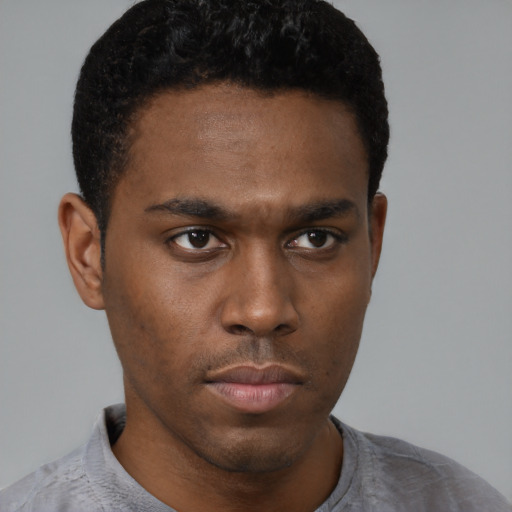 Neutral latino young-adult male with short  brown hair and brown eyes