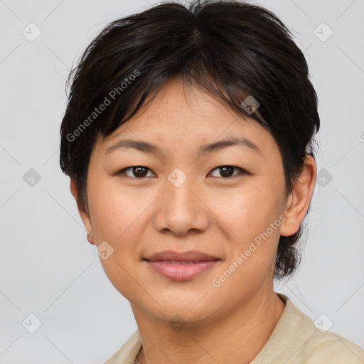 Joyful asian young-adult female with short  brown hair and brown eyes