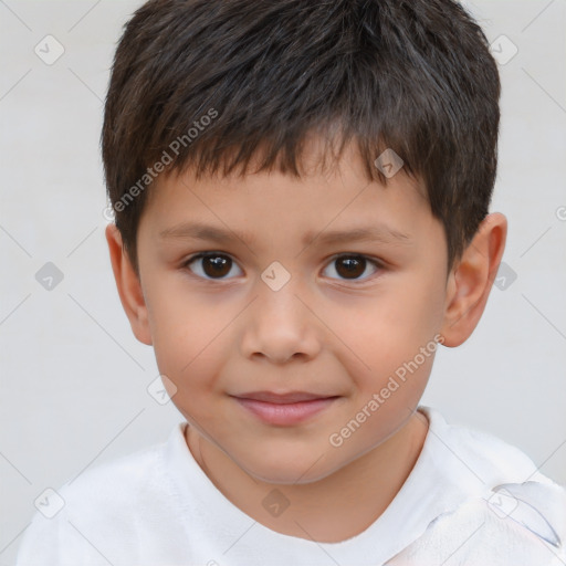 Joyful white child male with short  brown hair and brown eyes