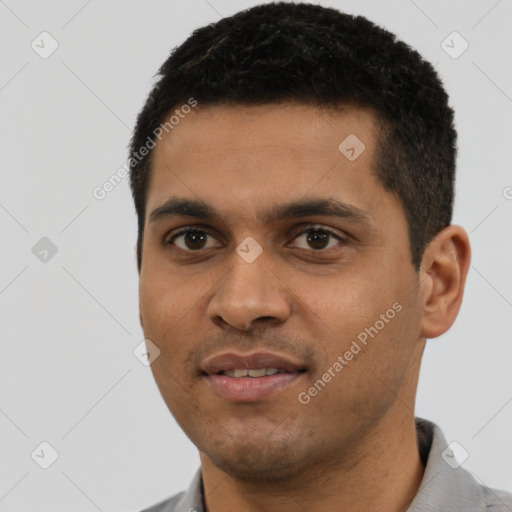 Neutral latino young-adult male with short  black hair and brown eyes