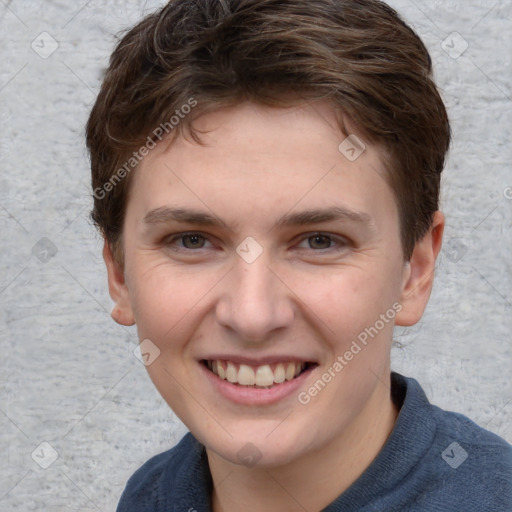 Joyful white young-adult female with short  brown hair and grey eyes