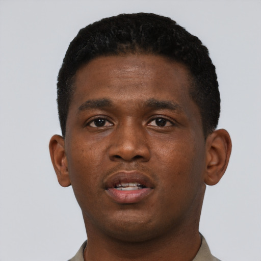 Neutral black young-adult male with short  black hair and brown eyes