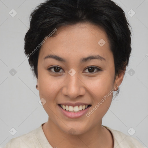 Joyful asian young-adult female with short  brown hair and brown eyes