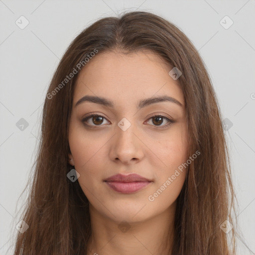 Neutral white young-adult female with long  brown hair and brown eyes