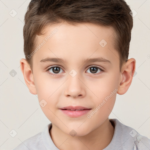 Joyful white child male with short  brown hair and brown eyes