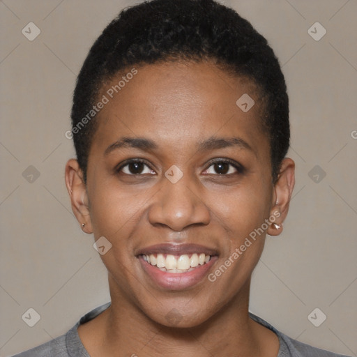 Joyful black young-adult female with short  brown hair and brown eyes