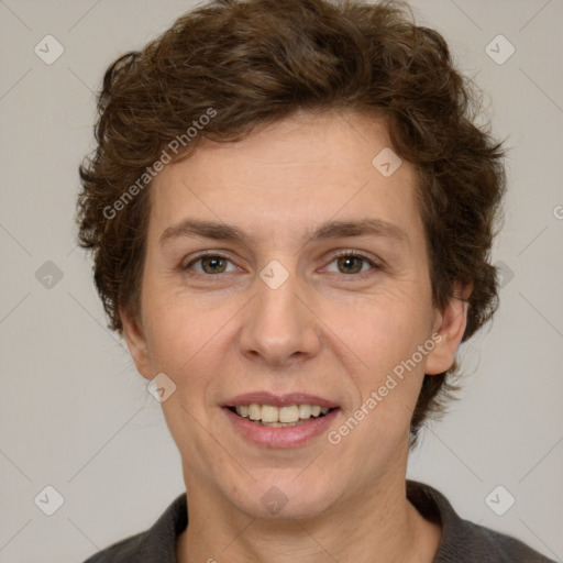 Joyful white adult female with short  brown hair and brown eyes