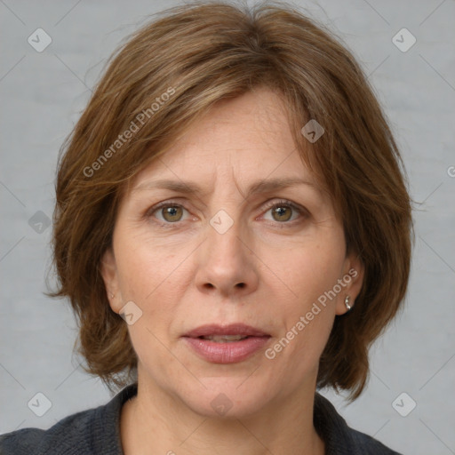 Joyful white adult female with medium  brown hair and grey eyes