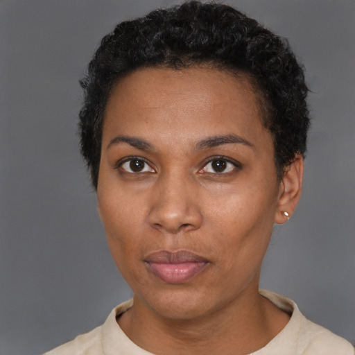 Neutral black young-adult female with short  black hair and brown eyes