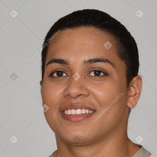 Joyful latino young-adult female with short  black hair and brown eyes