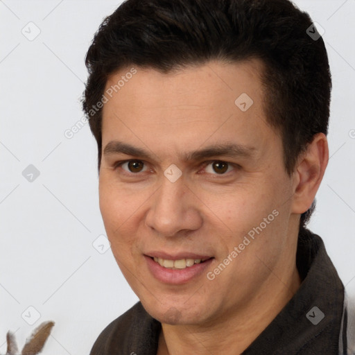 Joyful white adult male with short  brown hair and brown eyes