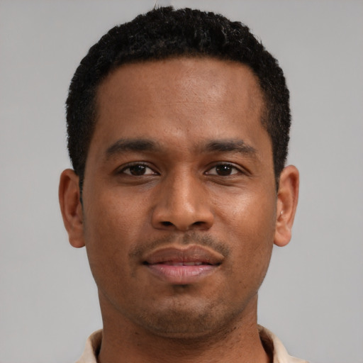 Neutral latino young-adult male with short  brown hair and brown eyes