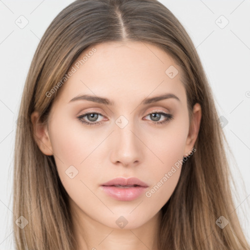 Neutral white young-adult female with long  brown hair and brown eyes