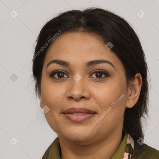 Joyful latino young-adult female with medium  brown hair and brown eyes