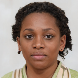 Neutral black young-adult female with short  brown hair and brown eyes