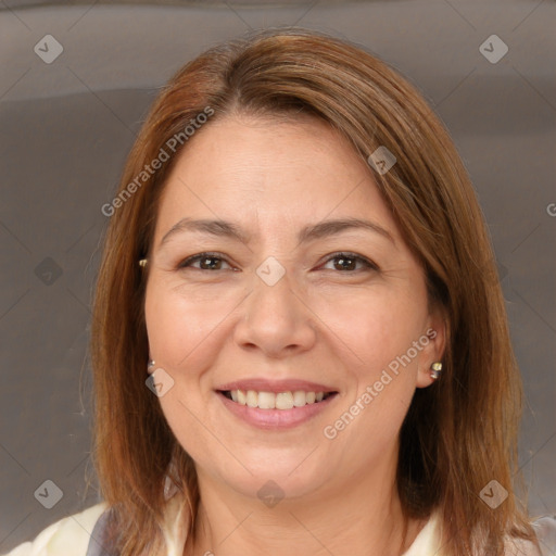 Joyful white adult female with medium  brown hair and brown eyes