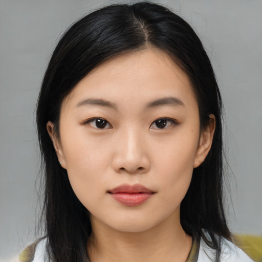 Neutral asian young-adult female with medium  black hair and brown eyes