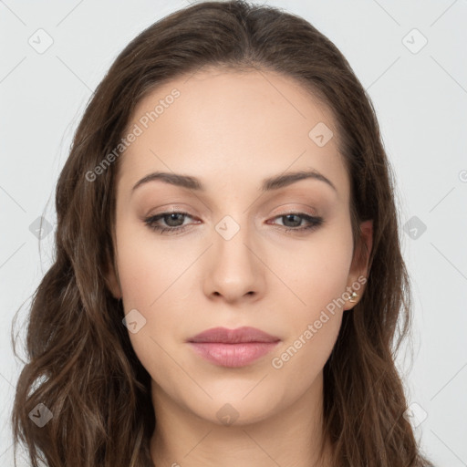 Neutral white young-adult female with long  brown hair and brown eyes