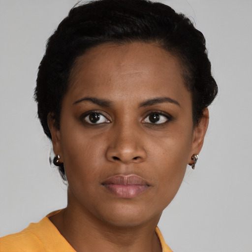 Neutral black young-adult female with short  black hair and brown eyes