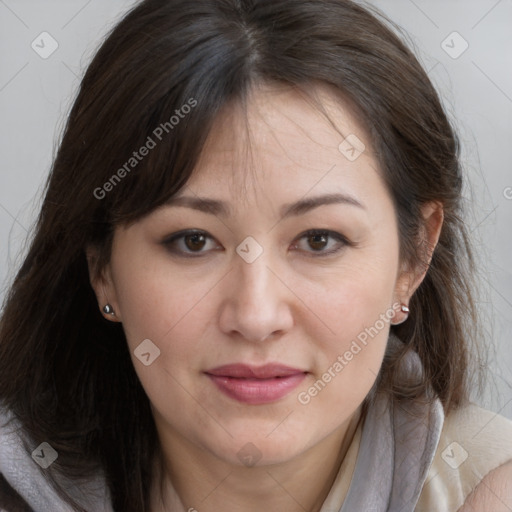 Joyful white adult female with medium  brown hair and brown eyes